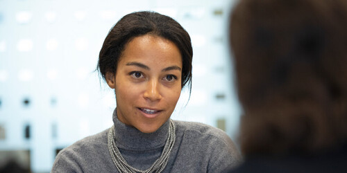 A woman being interviewed by another woman.